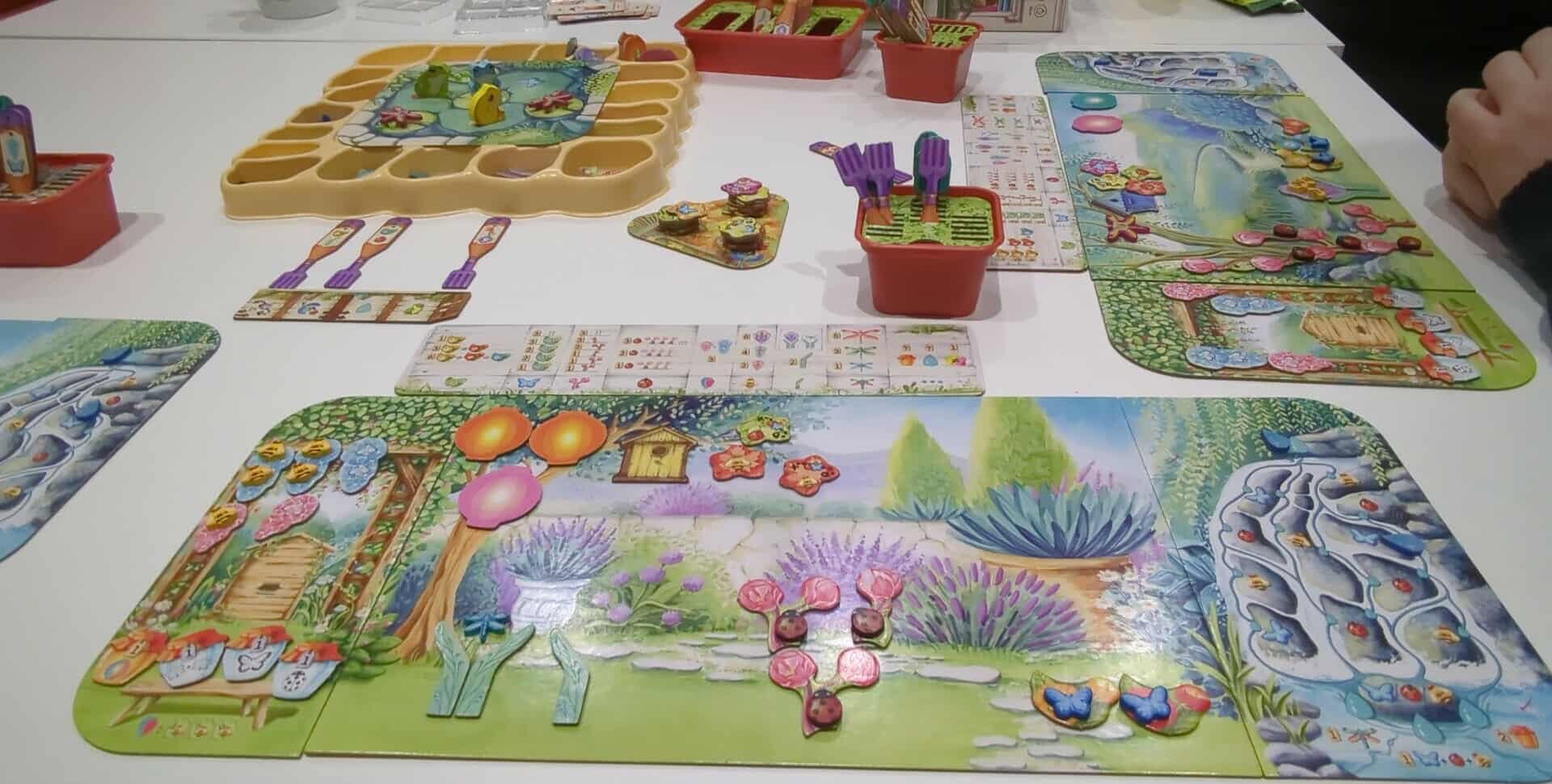 A garden-themed board game set out on the table.